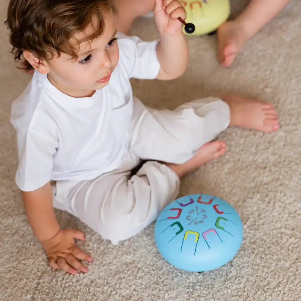 Baby Tambú Sky Kite Instrumento musical JuegaConmigo baby-tambu-sky-kite-instrumento-musical-luz-azul-acero-267