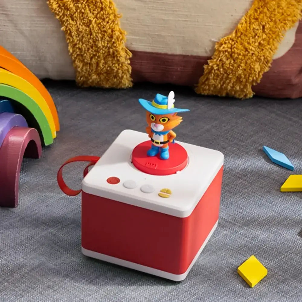 El Gato con Botas y otro Cuento Cuentos Audibles y Canciones FABA el-gato-con-botas-y-otro-cuento-dispositivo-rojo-blanco-en-forma-de-cubo-290
