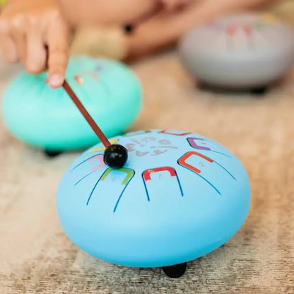 Baby Tambú Sky Kite Instrumento musical JuegaConmigo baby-tambu-sky-kite-instrumento-musical-luz-azul-ceramico-256